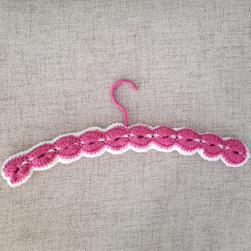 Vintage handmade knit clothing hanger